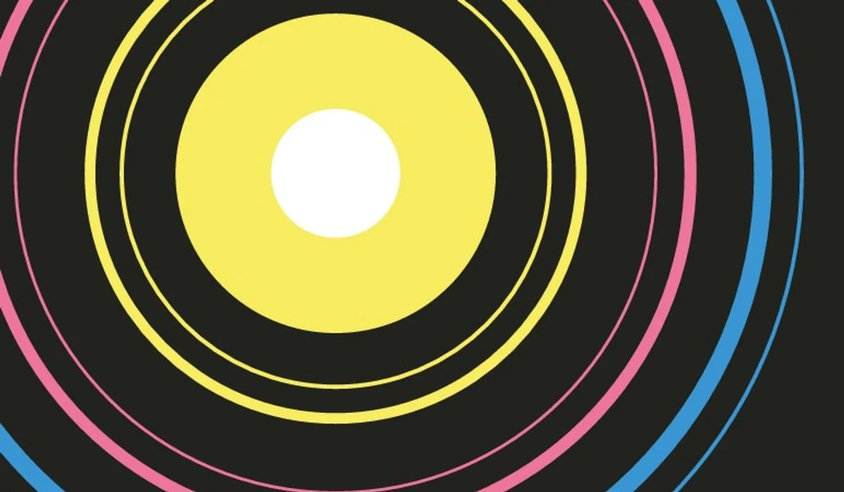 En svart bakgrund med färgglada cirklar i mitten.